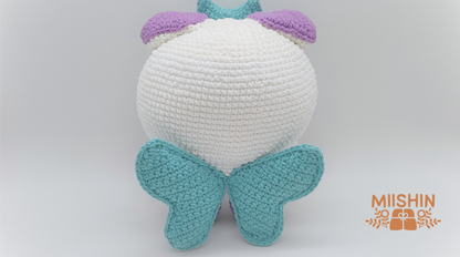 Handmade Jjongyo crochet plushie doll in white and purple yarn, handcrafted K-Pop amigurumi collectibles by Miishin. Back View.