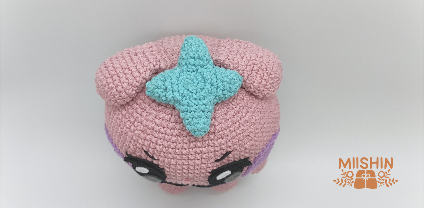 Top view of handmade Saniyo crochet plush
