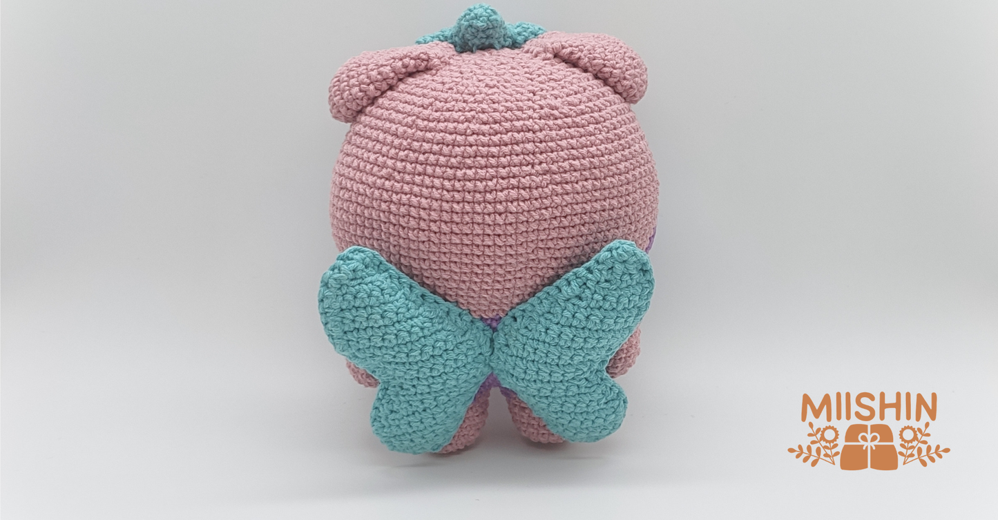 Back view of handmade Saniyo crochet plush